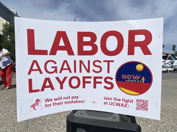 "Labor against layoffs" sign. Reads, "we will not pay for their mistakes. Join the fight at UCWAZ!"